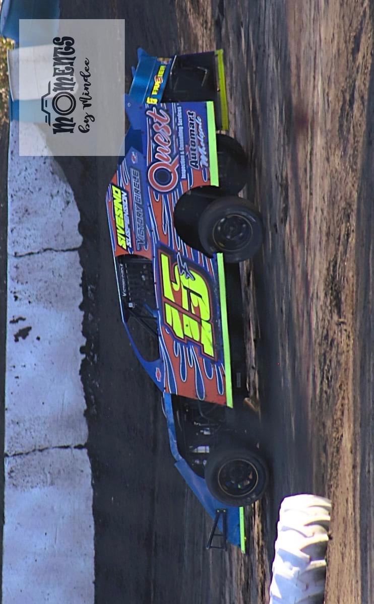 Matthew at the track in racing gear