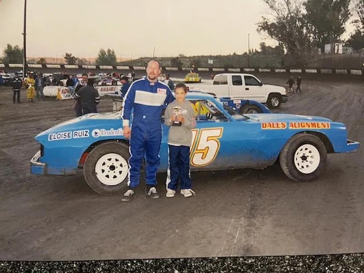 Michael Frazier with his original blue #15 Dale's Alignment car — the beginning of the legacy